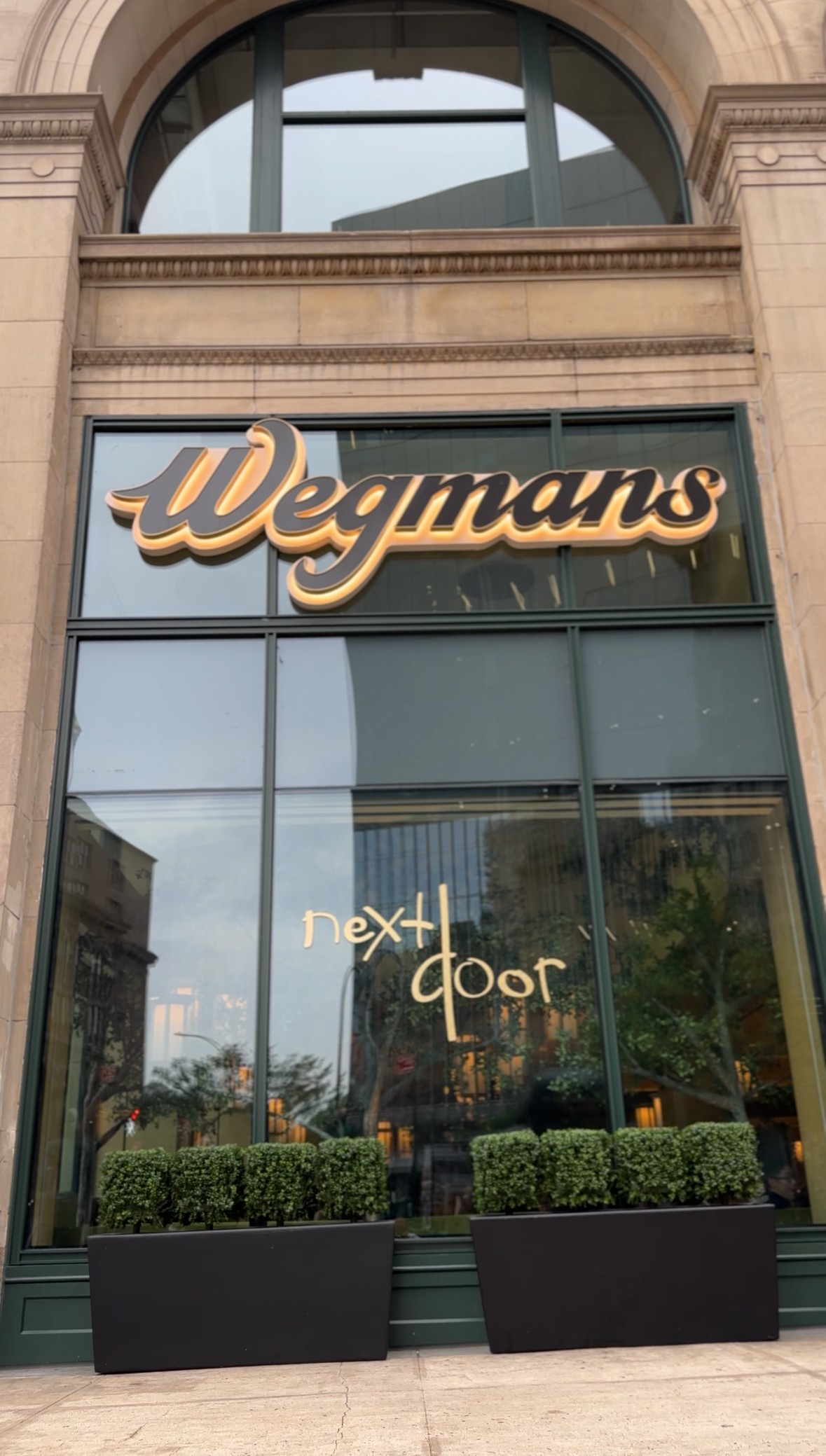 Outside Wegman's Next Door. Don't make the mistake of looking for a door. 